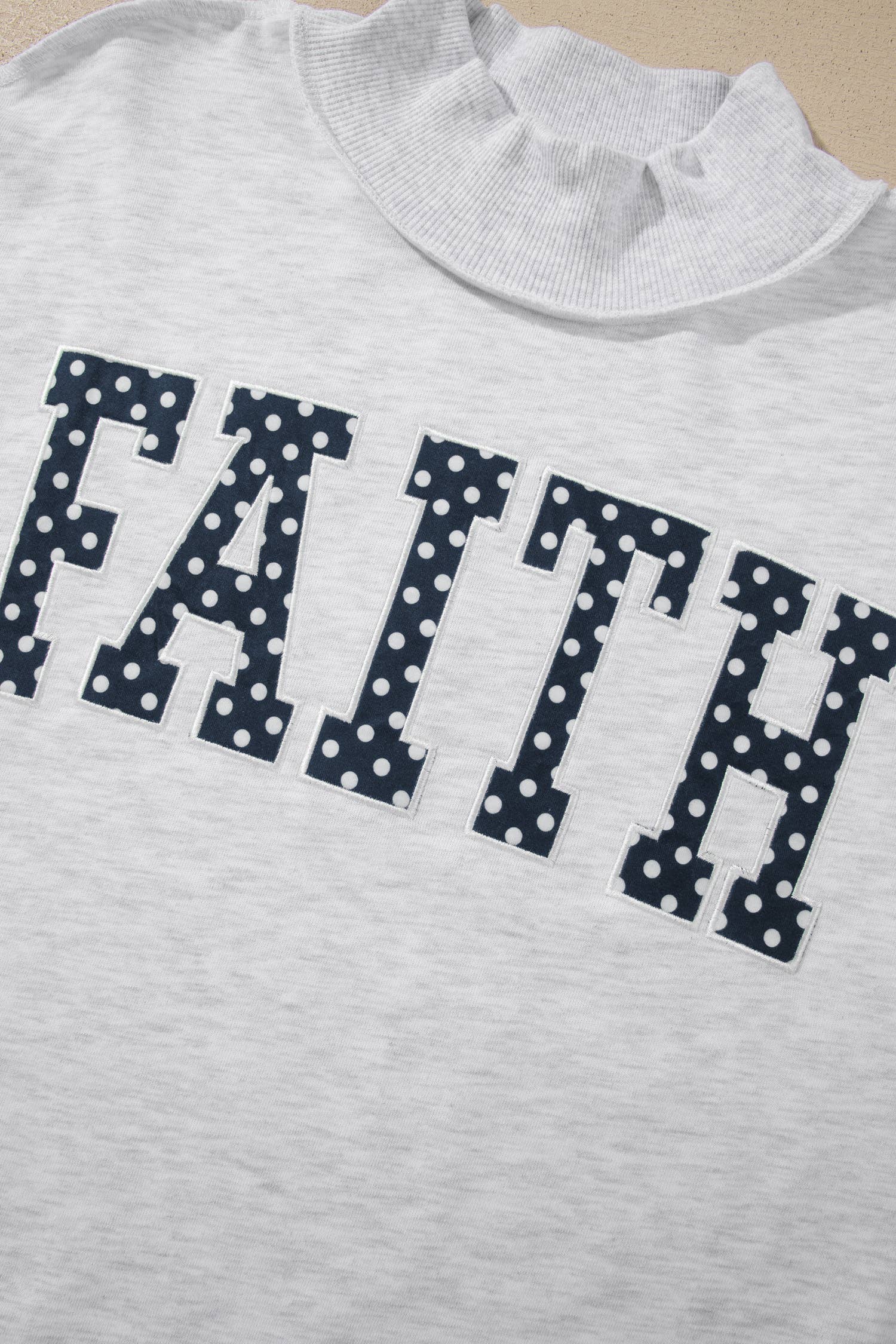 FAITH Polka Dot Mock Neck Sweatshirt
